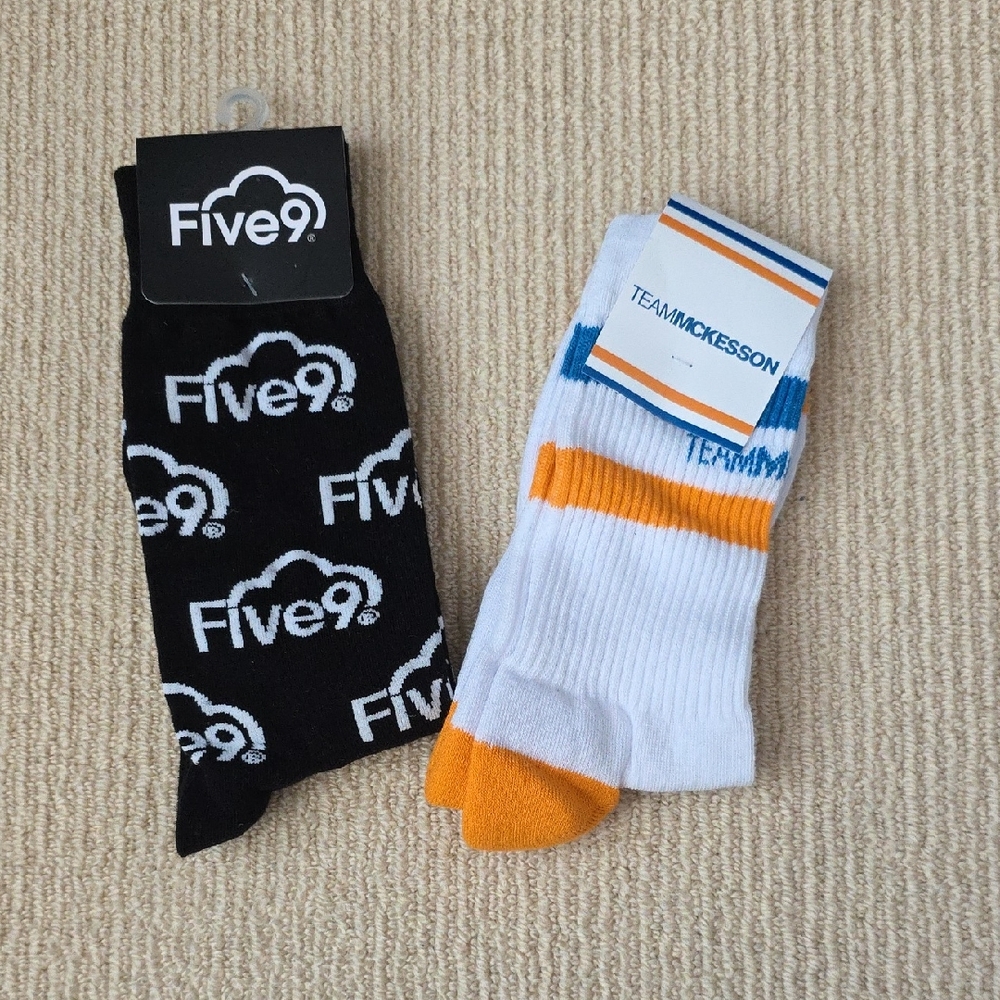 Five9 Black Socks and Team McKesson White and Orange Socks